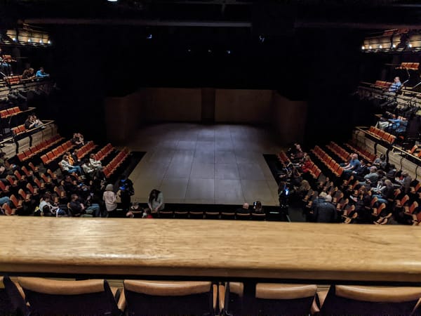 A photo of the empty scene taken from the balcony in Bridge Theatre as the public assembles